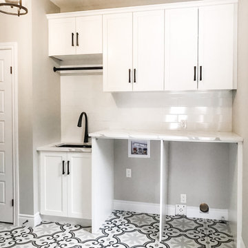 White Shaker & Patterned Tile Laundry Room