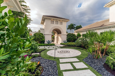 Huge mediterranean two-story house exterior idea in Miami