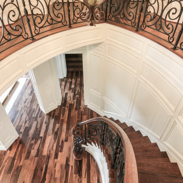 Project #74 | Circular Staircase with Hand-Forged Metal Panels