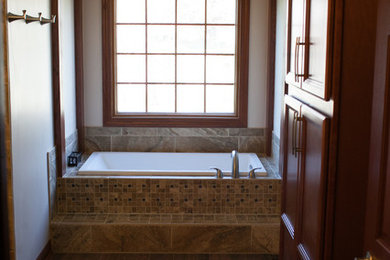 Design ideas for a large traditional master bathroom in Wichita with a double shower, ceramic floors, brown floor and an open shower.