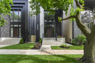 This is an example of a mid-sized modern two-storey exterior in Chicago.
