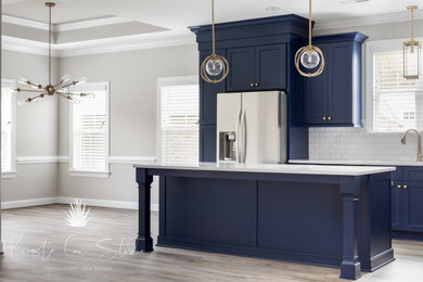 Kitchen - transitional kitchen idea in Other with shaker cabinets, blue cabinets and an island