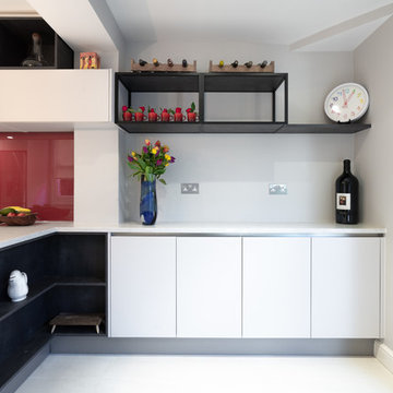Two tone kitchen with peninsula