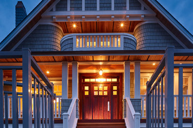 Mid-sized traditional blue two-story mixed siding exterior home idea in Vancouver