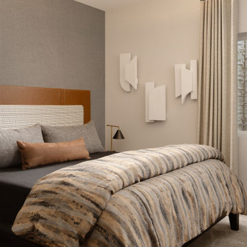 Bedroom Design with Leather and Black Metal Accents
