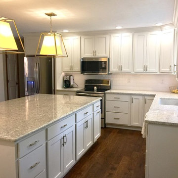 Davenport, IA- White Painted Kitchen With Gold Accents and Large Island