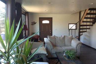 Example of a classic family room design in Kansas City with beige walls