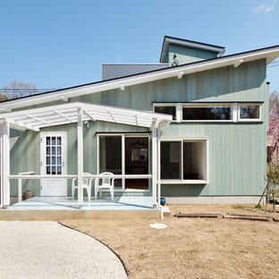 他の地域のトラディショナルスタイルのおしゃれな家の外観の写真