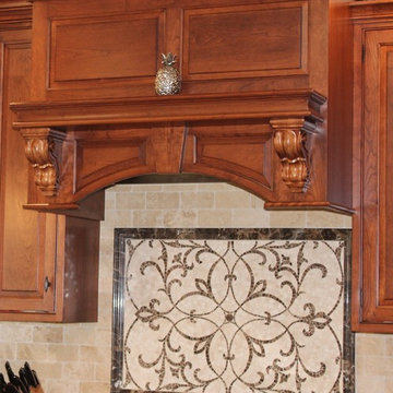 Tumbled Stone Backsplash with Custom Accent in Lancaster, PA.