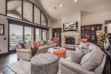 Family room photo in Salt Lake City with a stone fireplace