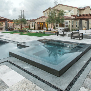 Gorgeous Infinity Pool with Multiple Outdoor Living Spaces