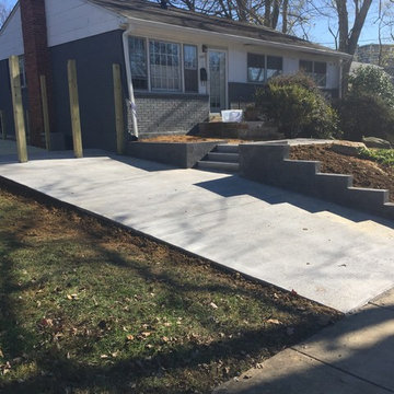 Stained Concrete Driveway in Kensington MD with Retaining Wall and Walkway