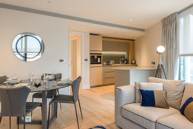 Small transitional dining room photo in London
