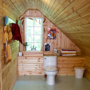 Country painted wood floor and green floor bathroom photo in Austin with brown walls, a drop-in sink, wood countertops and brown countertops