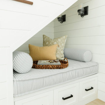 Coastal modern farmhouse stairwell nook bench shiplap