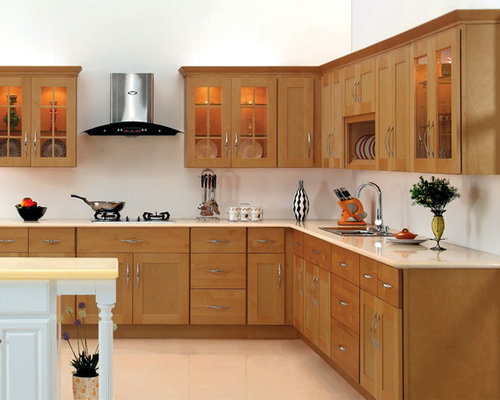honey shaker kitchen cabinets with white island
