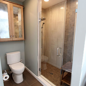 Transitional Masterbath with large sink, custom tiled shower and sitting area