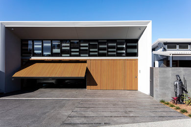 This is an example of a large modern garage in Brisbane.