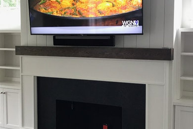 Example of a farmhouse home theater design in Chicago