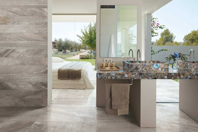 Example of a large trendy master porcelain tile bathroom design in Baltimore with beige walls and a vessel sink