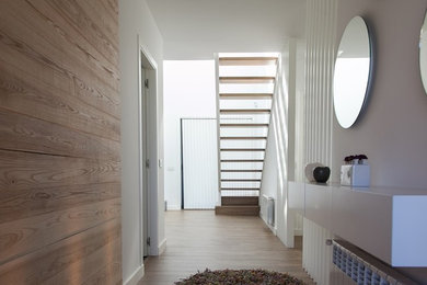 Inspiration for a contemporary hallway remodel in Other