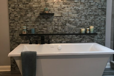 Inspiration for a contemporary ceramic tile bathroom remodel in Cleveland