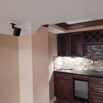 Basement remodel, custom entertainment system, kitchenette