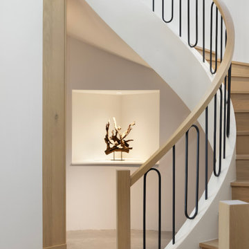 Interior - Circular Stair with Wood and Iron Balustrade