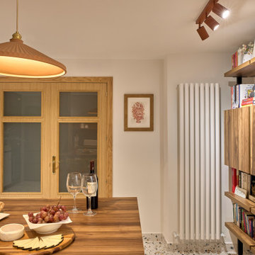 Cocina luminosa y baños atemporales