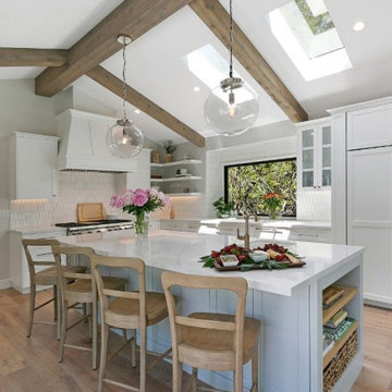 Transitional Kitchen Remodel with Exposed Beams and Skylights