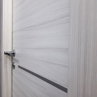 ナポリの小さいコンテンポラリースタイルのLDKの画像 (グレーの壁、磁器タイルの床、ベージュの床)