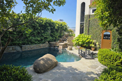 Inspiration for a small 1950s courtyard stone and kidney-shaped natural pool landscaping remodel in San Francisco