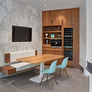 Large contemporary kitchen pantry designs - Inspiration for a large contemporary l-shaped concrete floor kitchen pantry remodel in Edmonton with a double-bowl sink, flat-panel cabinets, marble countertops, blue backsplash, glass tile backsplash, paneled appliances and an island