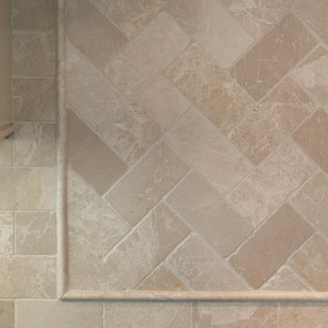Herringbone diagonal subway tile behind Wolf Gas Cooktop