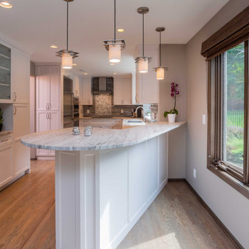 Modern Gray and White Kitchen with Peninsula Seating for 4
