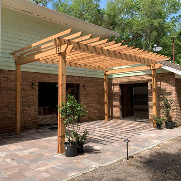 Xeriscape in Florida Large Property No Lawn just Plants Hardscape Pergola Arbor