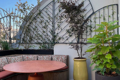 Exemple d'une terrasse chic.
