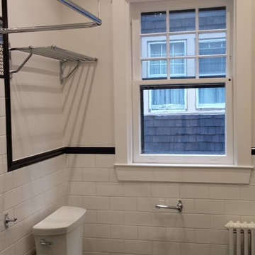Takoma DC traditional back and white bathroom with penny tile