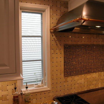 narrow hood flanking windows