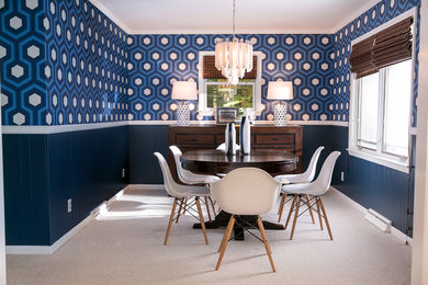 Mid-sized mid-century modern carpeted and beige floor enclosed dining room photo in Charlotte with multicolored walls and no fireplace