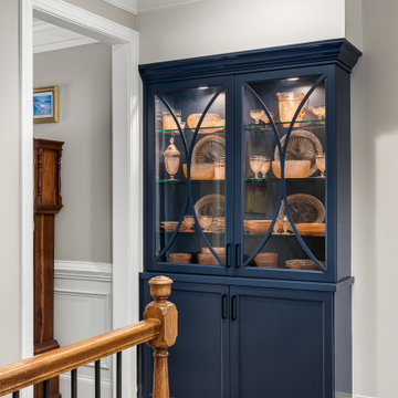 Built in china cabinet feature WWII glass