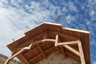 Example of a mountain style home design design in Milwaukee