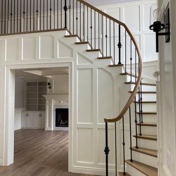 Painted and stained stairway with view into office (white painted wainscoting)