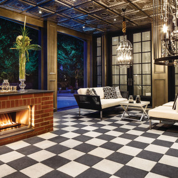 Traditional poolside paradise with grey and black pavers