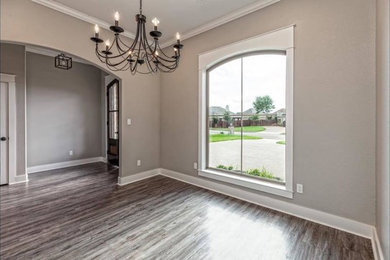 Living room - transitional enclosed gray floor living room idea in Los Angeles with beige walls