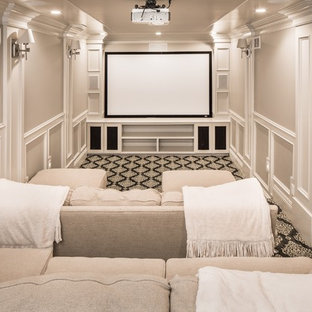 Home theater - traditional enclosed carpeted and black floor home theater idea in Salt Lake City with beige walls and a projector screen