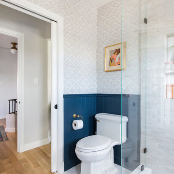 emily henderson's classic modern master bathroom with weathered white subway