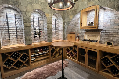 Trendy wine cellar photo in Vancouver