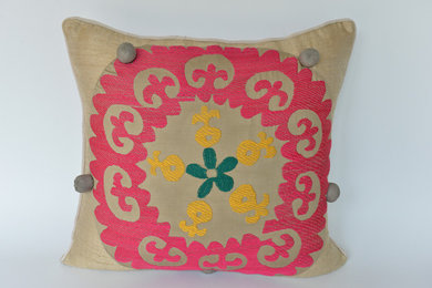 Cushion with fine suzani appliqué on silk