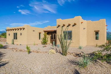 Southwestern exterior home idea in Phoenix